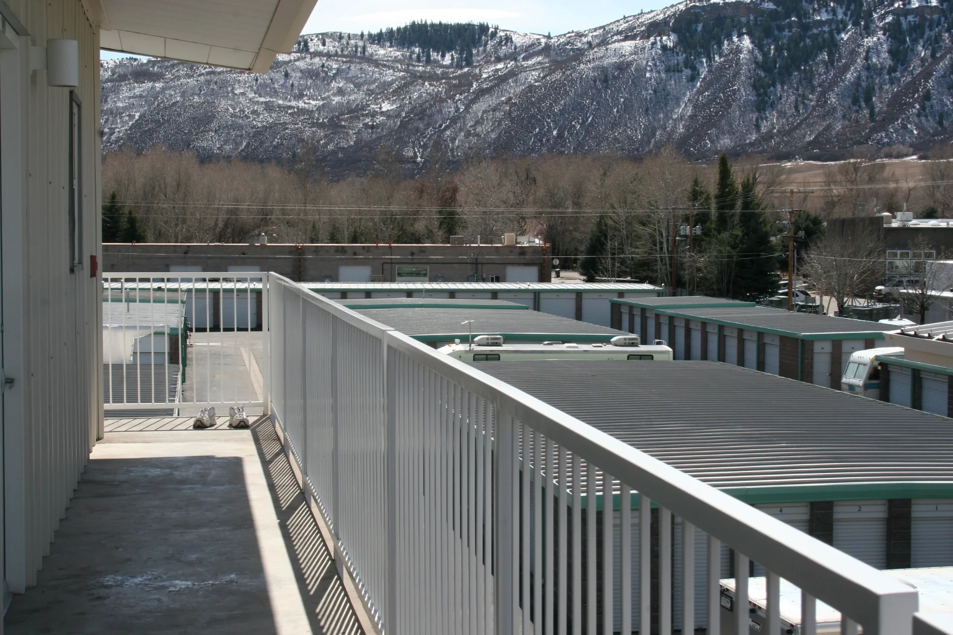 Storage units at All Hours Storage in Basalt with a snow dusted mountain behind the property